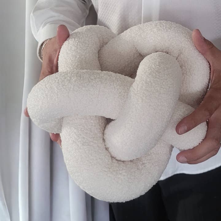 Boucle Knot pillow in Button shape, Scandinavian accent for wholesale by SUF Products LLC