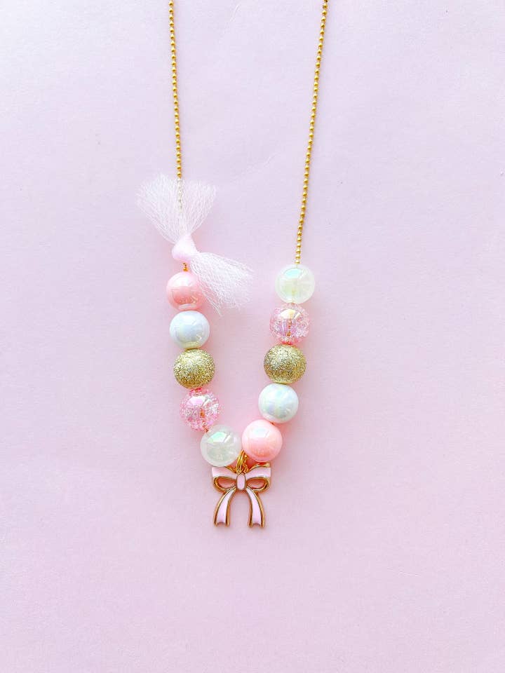Kids Pink Bow Charm Necklace for wholesale by The Rainbow Mermaid