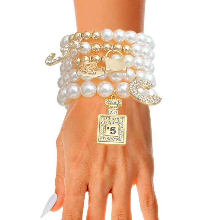 Cream Pearl No. 5 Boutique Charm Bracelets for wholesale on Faire