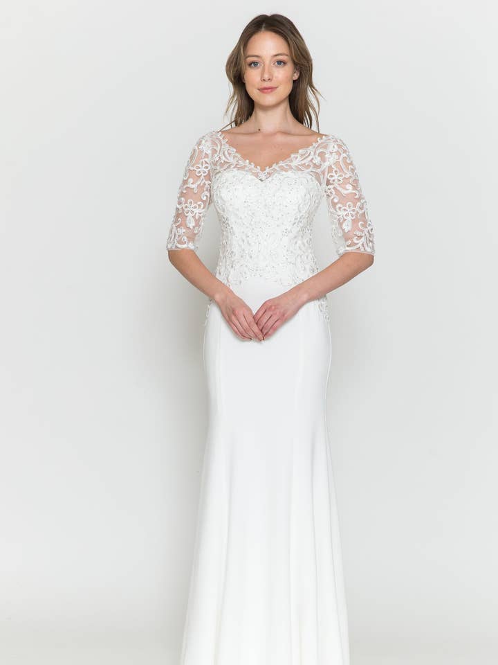 8560 JERSEY EMBROIDERY & RHINESTONE
3/4 SLEEVES
V NECK
ILLUS for wholesale by POLY USA