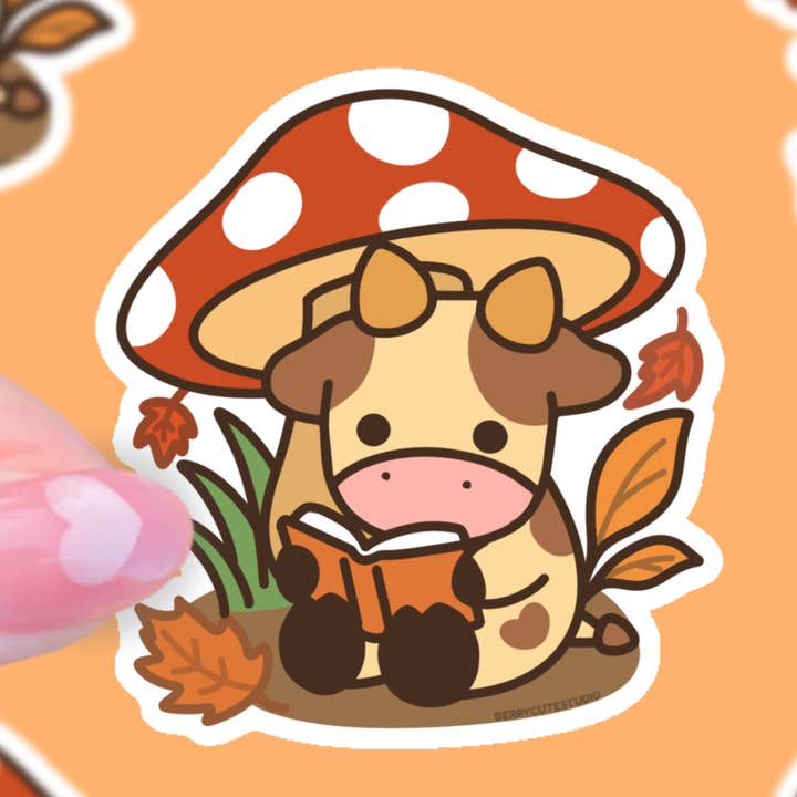 Autocollant en vinyle de vache confortable lisant sous un champignon en automne pour la vente par BerryCuteStudio