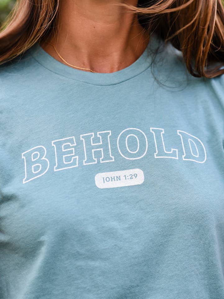 Behold Christian graphic tee, bible verse tee, faith based for wholesale by Six Notes Christian Clothing