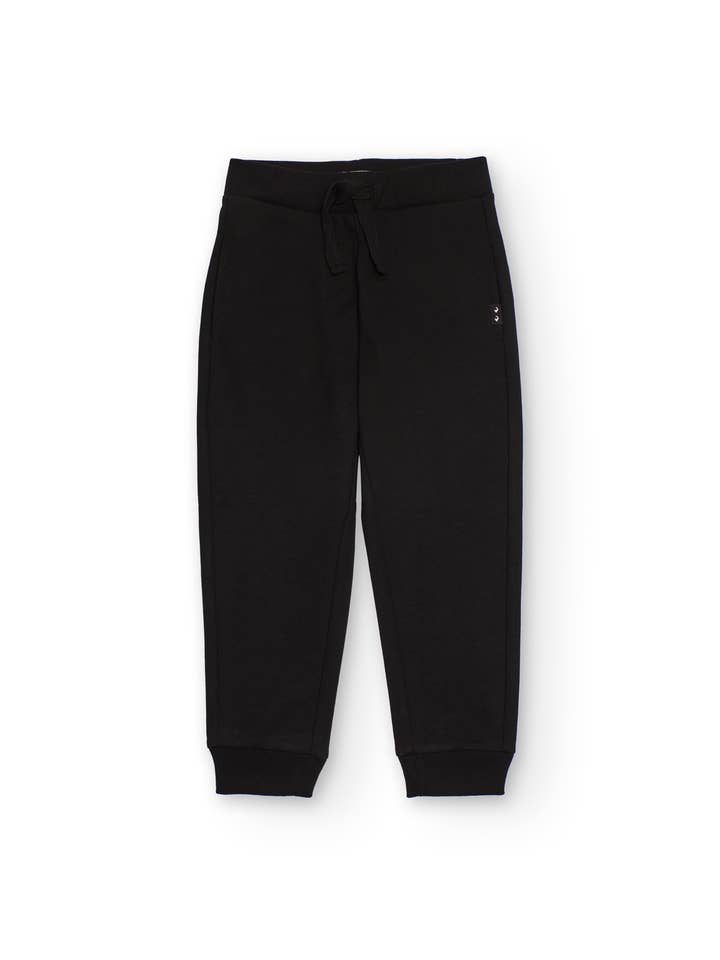 Pantalon jogger basique pour garçon en couleur noire. pour la vente par tuc tuc