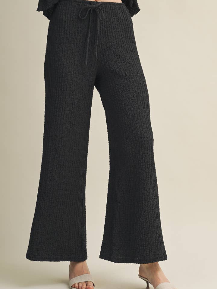 CALÇAS TEXTURIZADAS COM EFEITO BOLHA E FRANZIDO por atacado de Mustard Seed