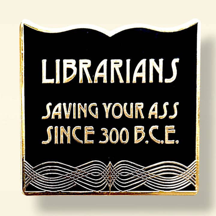 Librarians Saving Your Ass Book Shaped Enamel Pin for wholesale by Library Cat Designs