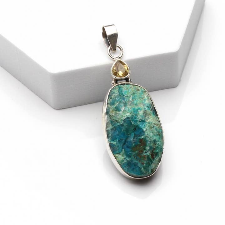 Raw chrysocolla pendant with faceted gemstone in silver for wholesale by UniArt
