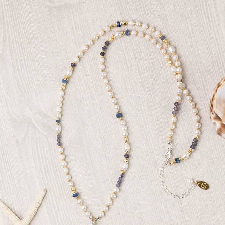 Seaside 26-28" Kyanite, Freshwater Pearl, Iolite Collage Focal Necklace and other Purchase Wholesale caren. Free Returns & Net 60 Terms on Faire trending on Faire.