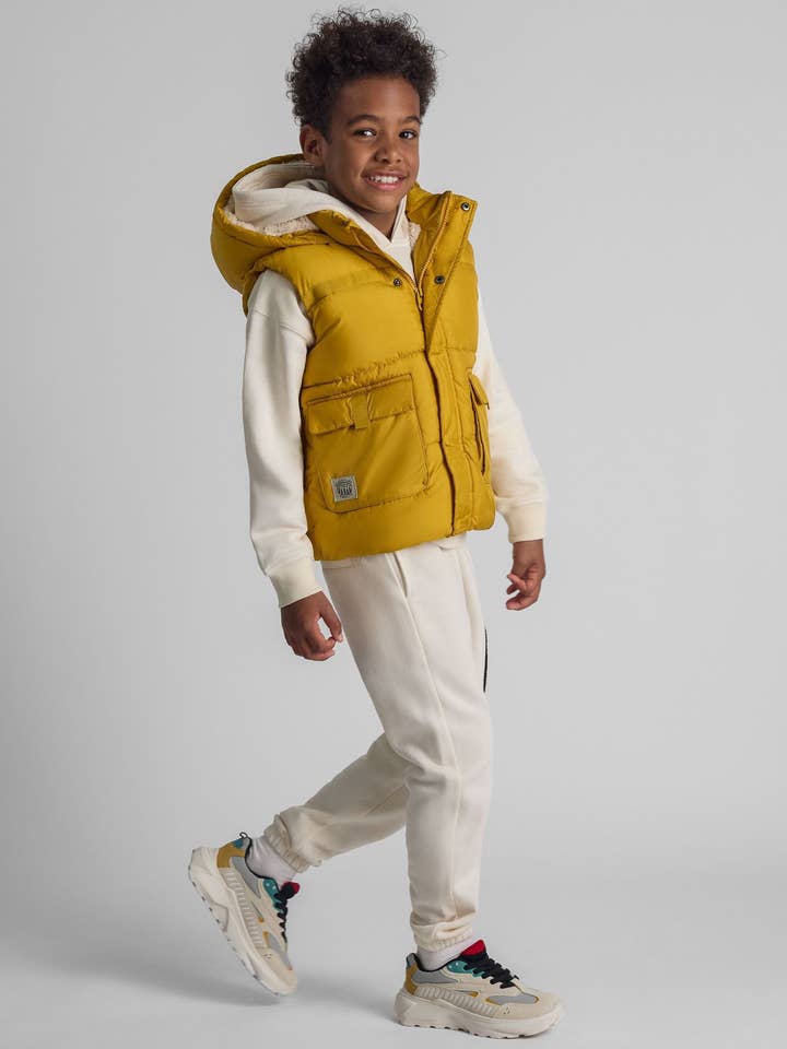 Jongens gilet met capuchon en zakken mosterd 9m-8y voor wholesale door Minoti sp. z o.o.