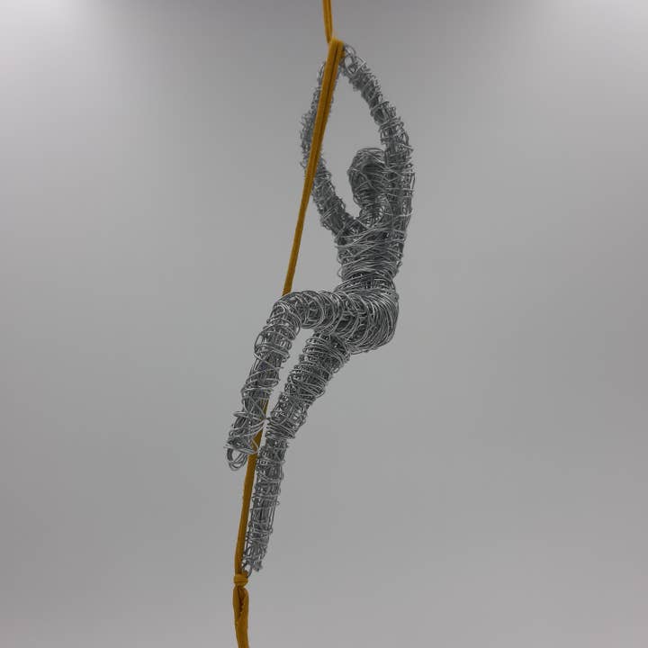 Climbing Figure, Climbing Wire Sculpture, Wall Decor for wholesale by Haritopoulou
