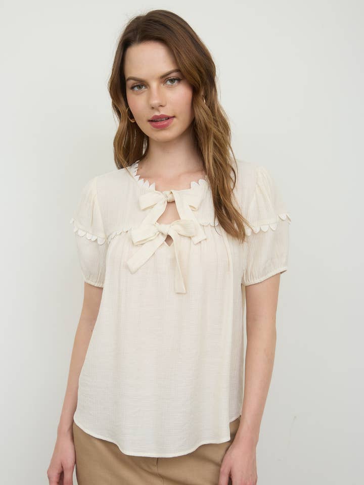 SCALLOP TRIM FRONT TIE DETAIL PUFF SLEEVE TOP for wholesale by Blu Pepper