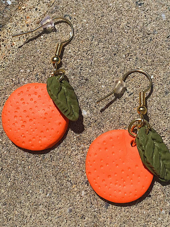 Orange Dangles for wholesale by Polymearrings Jewelry Co.
