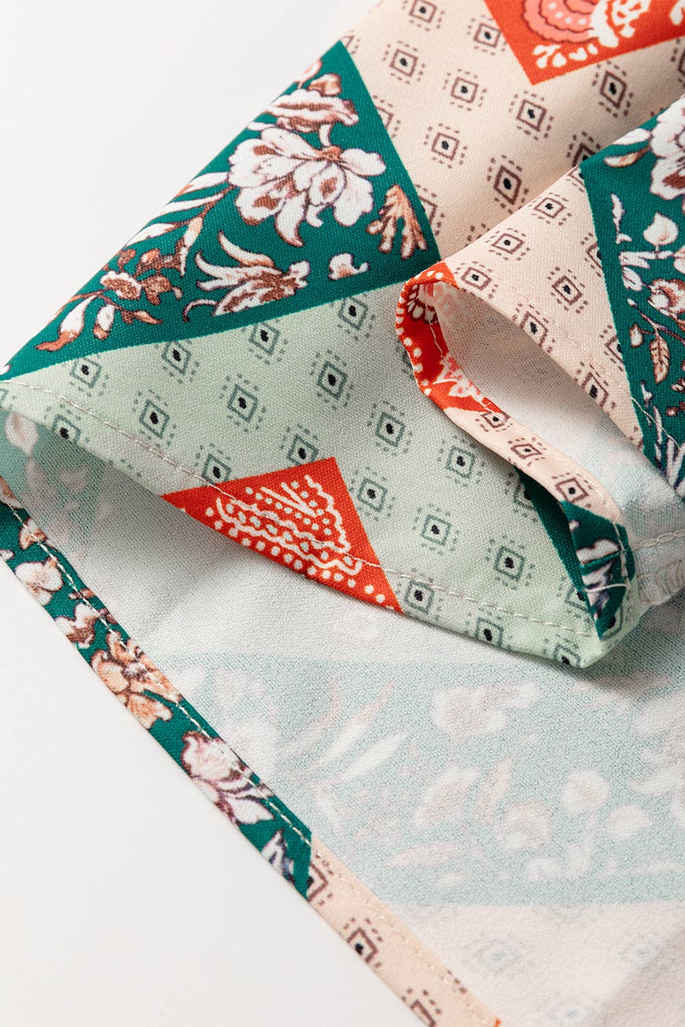 Jet Stream Paisley Geometric Patchwork Crew Neck Loose Fit Top for wholesale on Faire5