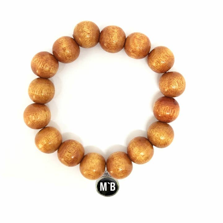 Mo`Beads oranje armband, gemaakt van houten kralen voor wholesale door Escapulario