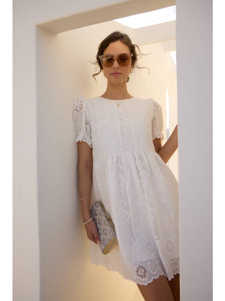 OFF WHITE FLORAL EMBROIDERY BABYDOLL MINI DRESS WITH BORDER for wholesale on Faire