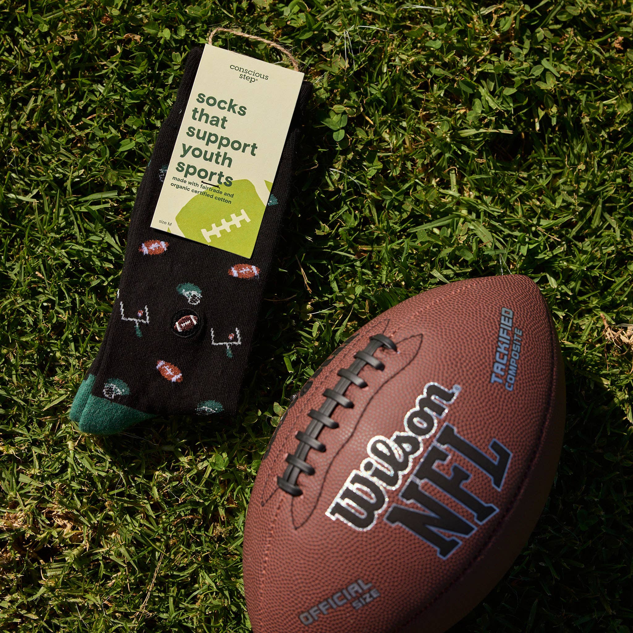Conscious Step - Wholesale Socks - Unisex - Socks that Support Youth Sports (Black Footballs)2