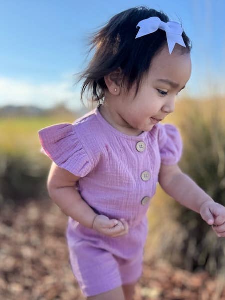 The Lucy-Thistle-Organic Muslin capsleeve romper for wholesale by Mimi & Me