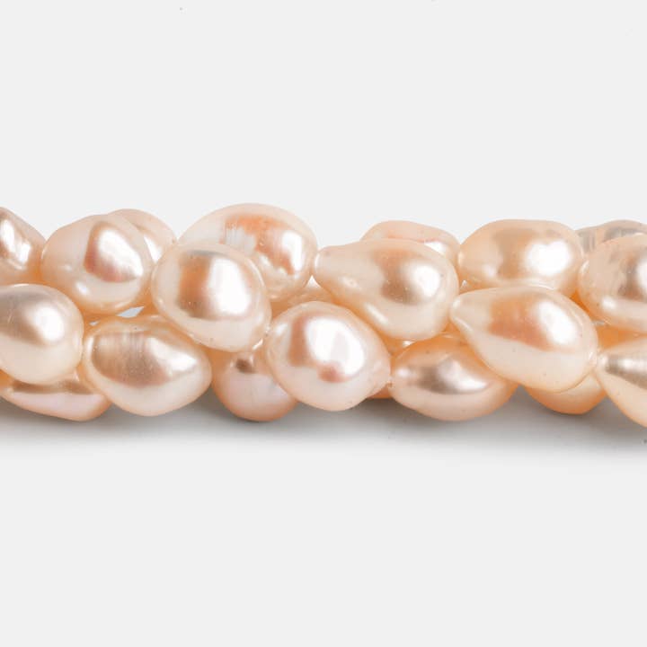 Pérolas Barrocas Pêssego 12x9mm 15 polegadas 30 contas por atacado de The Bead Traders