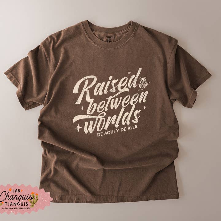 Raised Between Worlds Tee — Bicultural Comfort Colors for wholesale by Las Changuis Tianguis