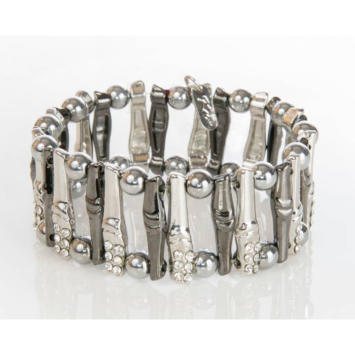 Bracelet extensible de magnétothérapie. pour la vente par Peaceful Village Inc.