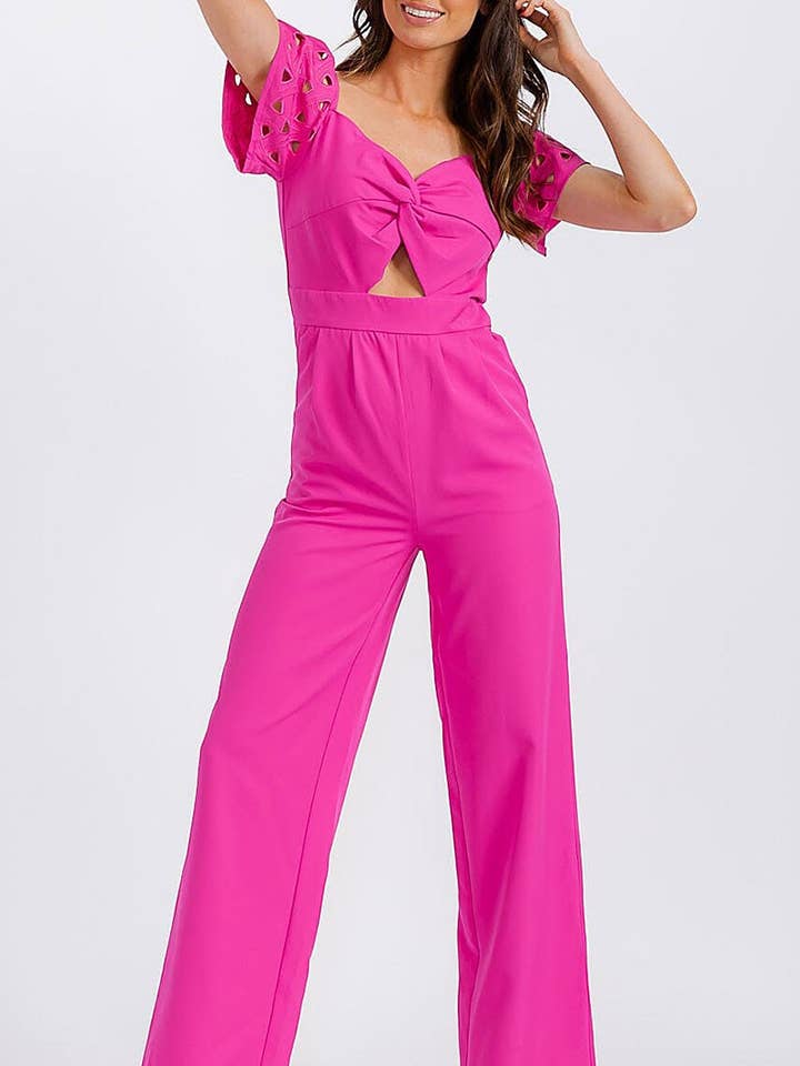 MONO DE PIERNA ANCHA CON ESCOTE EN V, RECORTES Y BOLSILLOS DELANTEROS para venta al por mayor de ROUSSEAU