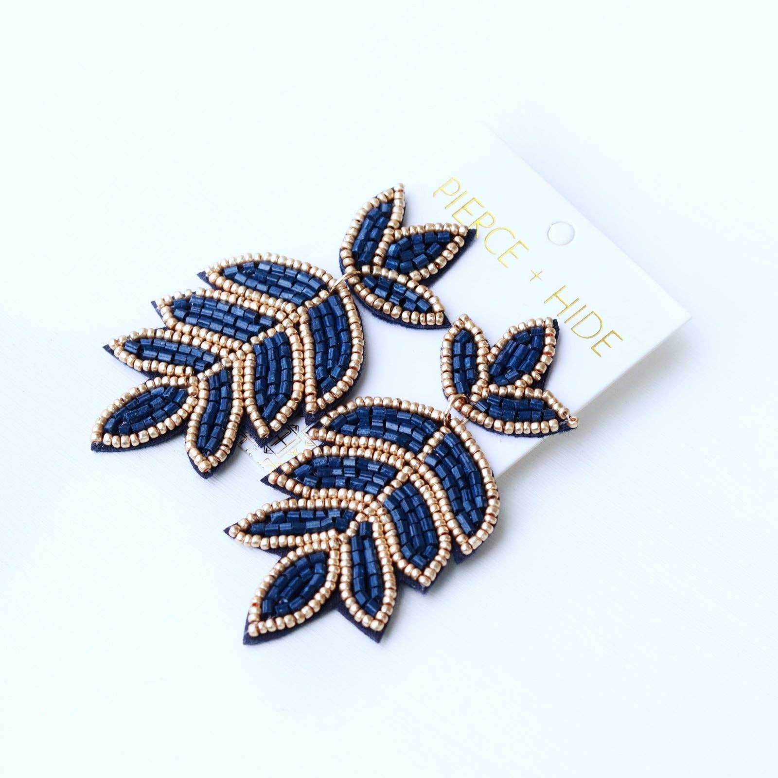 Pierce + Hide - Wholesale Dangle Earrings - Custom Navy Beaded Fleur De Lis Earring| Leaf Drop2