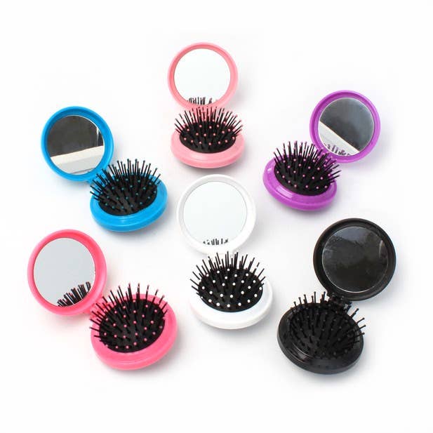 Folding compact hair brush with mirror for wholesale by Inca UK