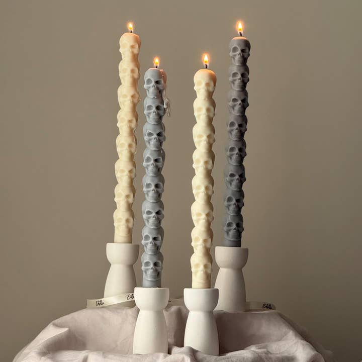 Hand Poured Soy Wax Skull Taper Candle: Halloween Decor for wholesale by Estelle Studio