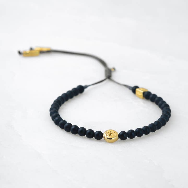 Pulseira MALA - Basalto-Dourado por atacado de Roseparo