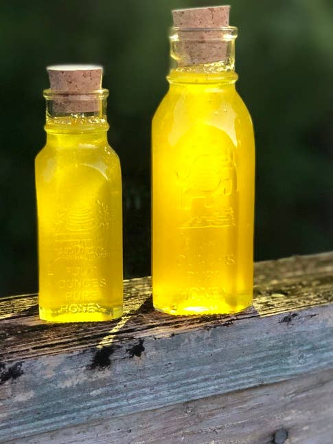 4oz Glass Muth Tupelo Honey for wholesale by Bee Wild Raw Honey