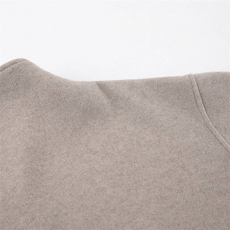 Brun Damefrakke med V-udskæring og dobbeltknaplukning i uld for engroshandel på Faire7