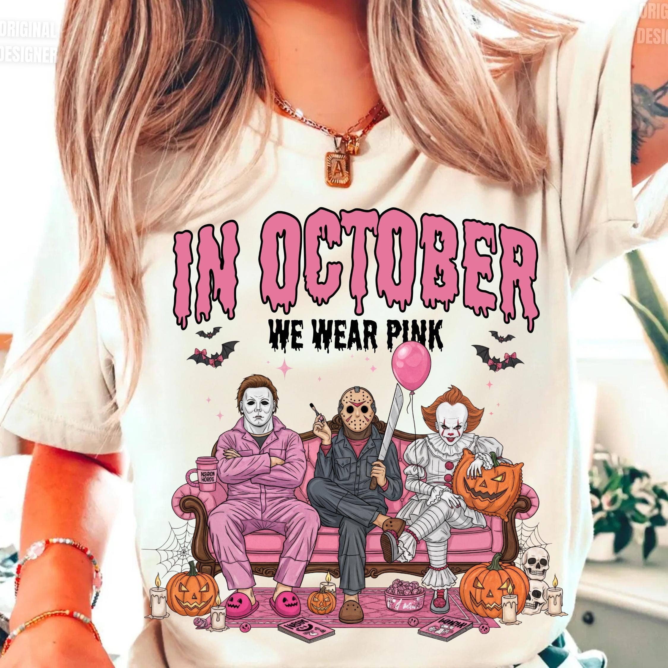 NVC Ecommerce LLC - Wholesale T-shirt met print - Uniseks - In oktober dragen we een roze shirt, personages Halloween-trui0