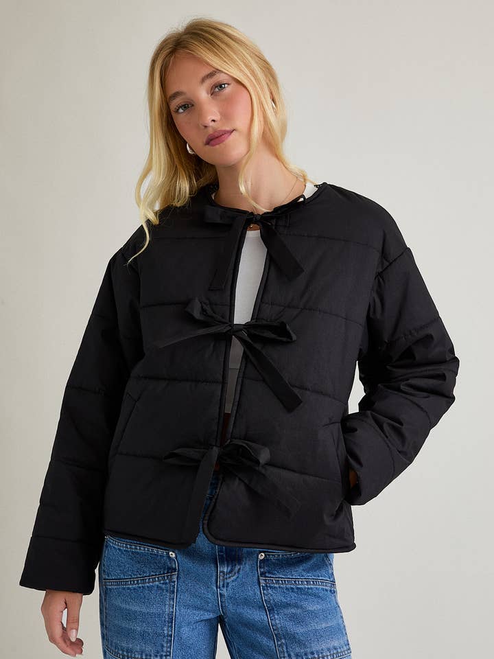 Black PUFFER JACKET WITH RIBBON TIE ON THE FRONT for wholesale on Faire0
