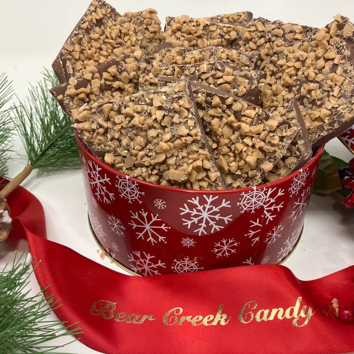 Milk Chocolate Toffee in a Holiday Tin 2 pounds for wholesale by Bear Creek Candy Kitchen