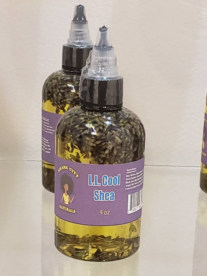 Huile pour cheveux et peau L L Cool Shea pour la vente par Shark City Naturals