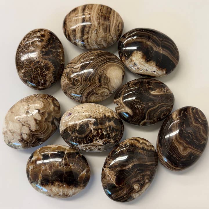 CHOCOLATE CALCITE PALM STONES for wholesale by Metaphysical & Healing Crystals