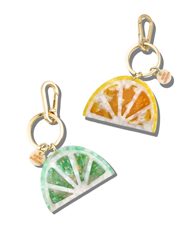 Hand-painted Citrus Slice Bag Charm + Keychain for wholesale by Solar Eclipse