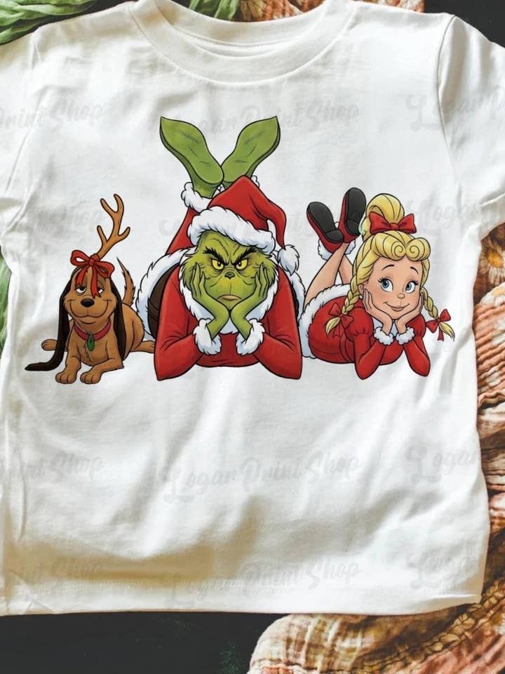 Grinchmas Kerstpersonages grafisch T-shirt voor wholesale door Tiny trendz teez