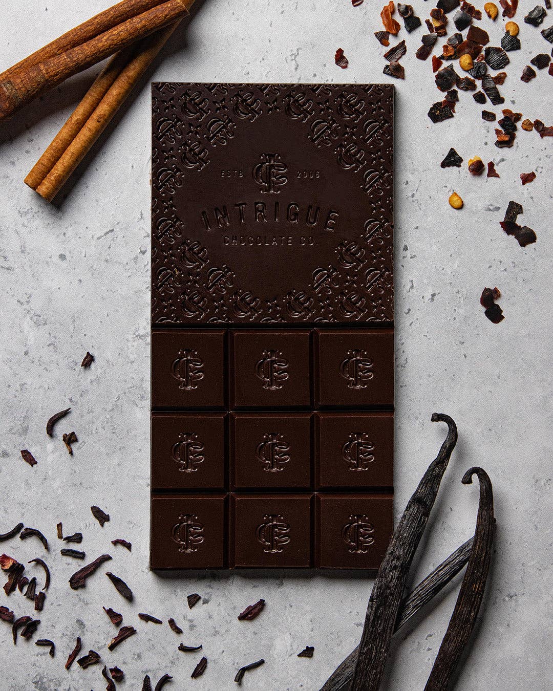 Intrigue Chocolate Co. - Wholesale Chocolate Bar - Guajillo Chili, Hibiscus, Cassia Cinnamon, Vanilla Bean Bar1