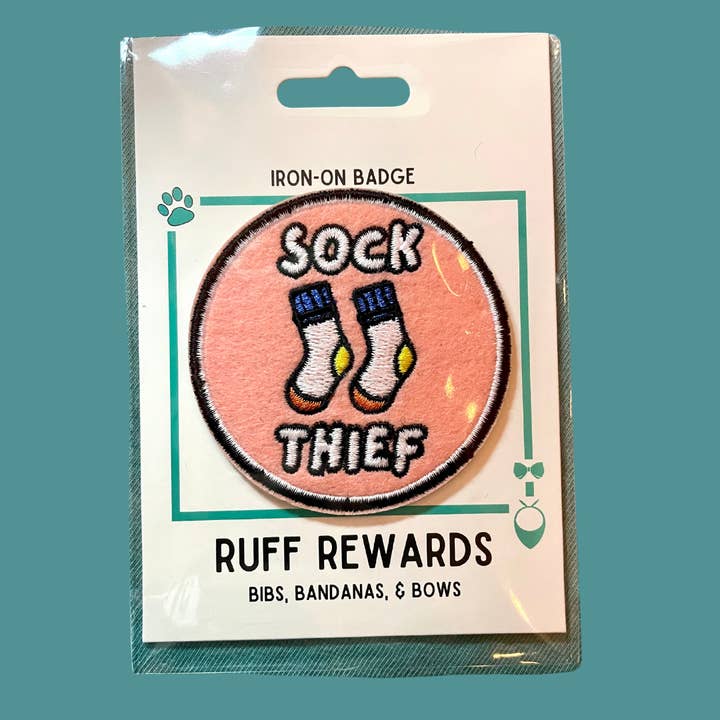 Ruff Rewards Sock Thief Iron-On Badge for wholesale by Bibs, Bandanas, & Bows