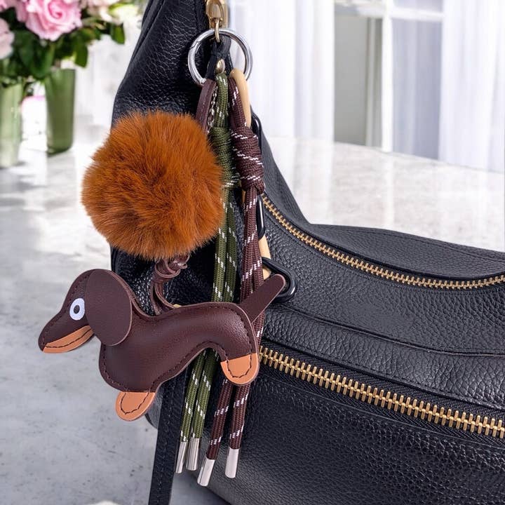 Brown Bag charm and keychain Dog and pompom PC11 for wholesale on Faire