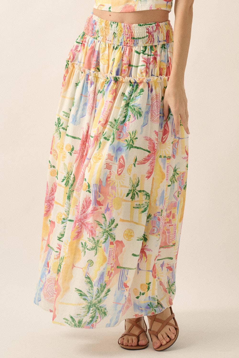 Crème Jupe longue smockée à imprimé aquarelle tropical. en vente sur Faire6