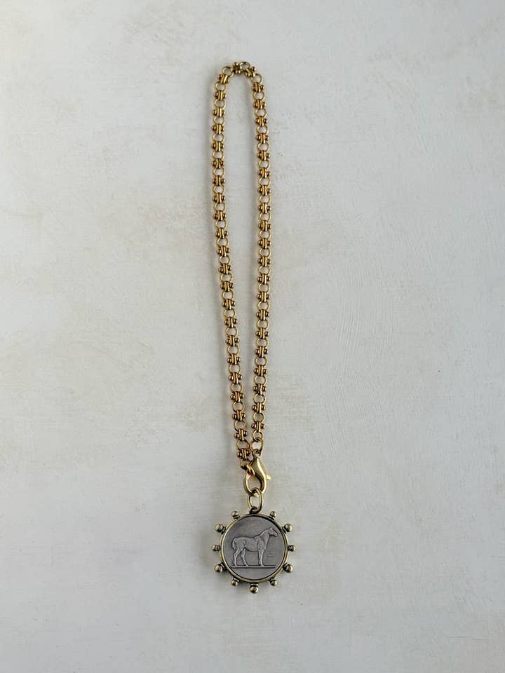 Shadowfax brass equestrian pendant for wholesale by The Loved One
