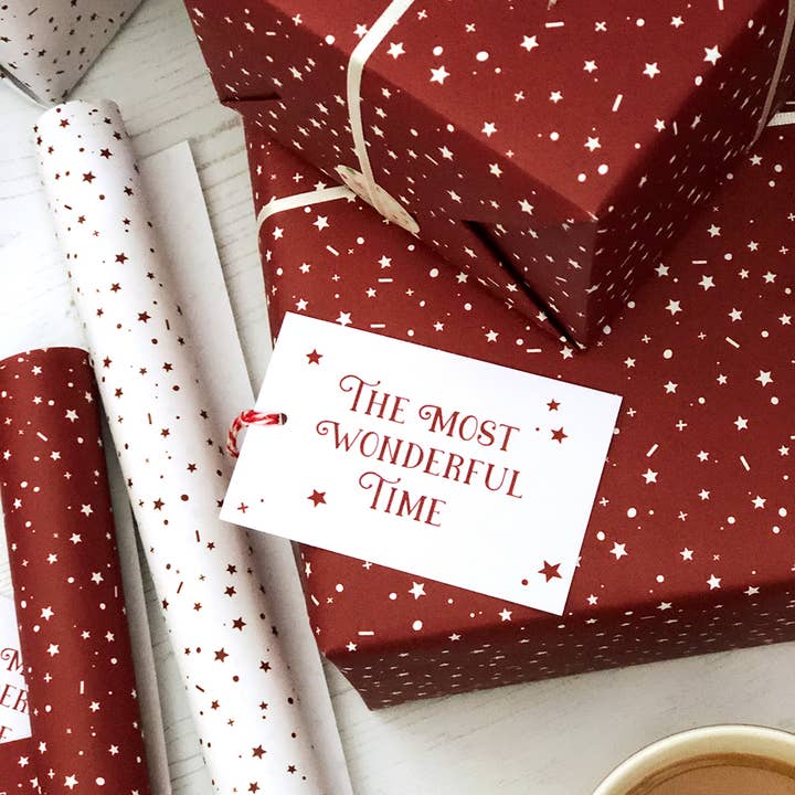 The Most Wonderful Time Red Christmas Wrapping Paper for wholesale by Clara and Macy