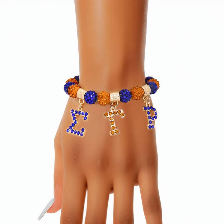 SGRHO Sorority Armband mit glitzernden Buchstaben in Blau und Gold für den Großhandel von PinktownUSA