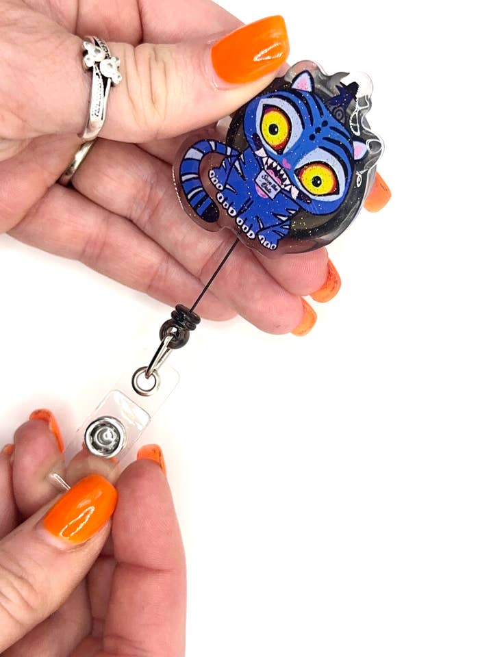 I Made It for the Tiger Derpy Tiger Glitter Acrylic Badge Reel for wholesale by A Little Crafty Fox