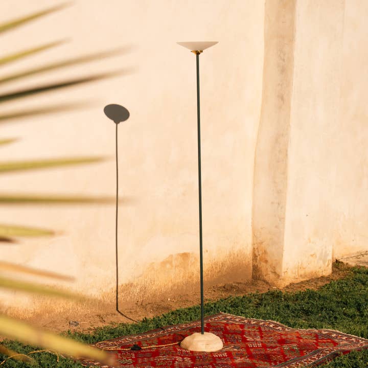 Standing Lamp with Sculpted Travertine Base for wholesale by Dweller Studio
