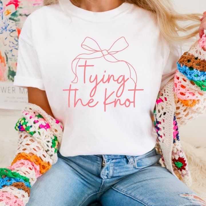 Tying The Knot Coquette Graphic Tee Bride Bachelorette for wholesale by Gia Gifts Boutique