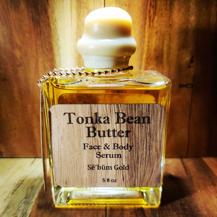 Sérum visage et corps au beurre de fève tonka pour la vente par Sē'bŭm Gold