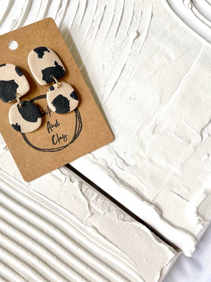 Brown Cow Polymer Clay Dainty Dangle for wholesale by Hooks and Clay