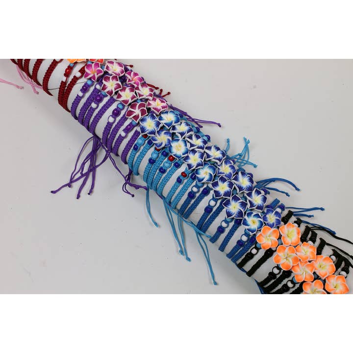 Western Counties Wholesale – wholesale Woven/braided bracelet – Tube Of Fimo Flower & Coloured Beads Wristbands1